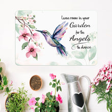 Load image into Gallery viewer, Hummingbird Metal Sign surrounded by flowers and garden elements, bringing serenity to any environment.