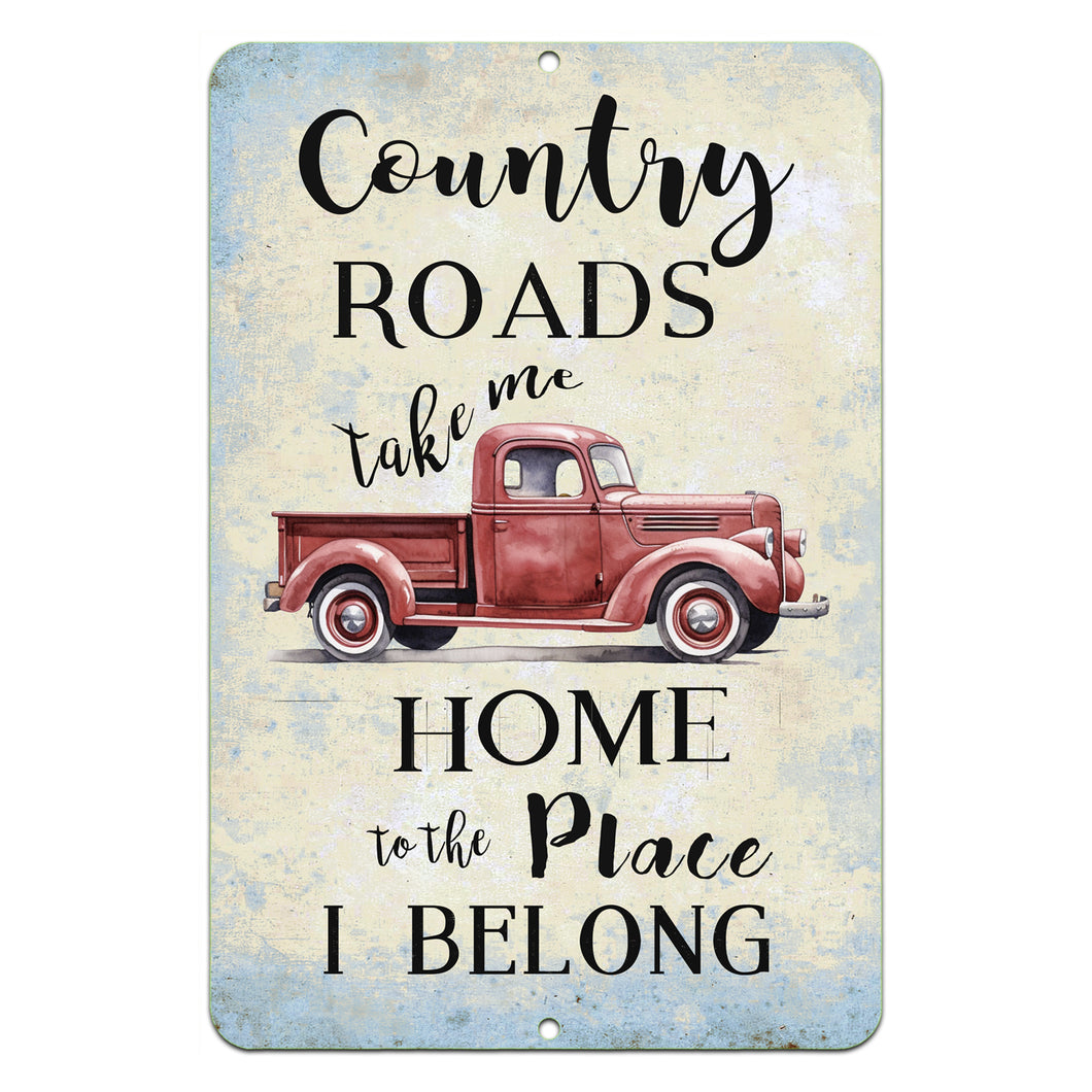 Country Roads Take Me Home Metal Sign by Dyenamic Art featuring a vintage red pickup truck with rustic typography on a distressed background.