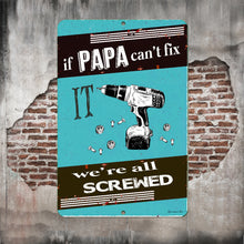 Load image into Gallery viewer, Dyenamic Art Papa Fix It Metal Sign displayed on a rustic wall, perfect for garages and workshops.
