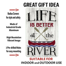 Load image into Gallery viewer, Life Is Better at the River Metal Sign by Dyenamic Art, made from industrial-grade aluminum with pre-drilled holes and a high-resolution weather-resistant finish for indoor or outdoor display.
