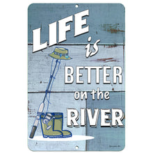 Load image into Gallery viewer, Dyenamic Art Life Is Better on the River Metal Fishing Sign – Rustic fishing-themed wall decor featuring a fisherman silhouette, rod and reel, and a distressed wood-style background.
