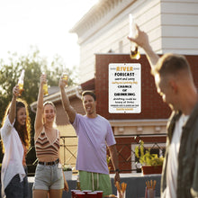 Load image into Gallery viewer, Dyenamic Art River Forecast Metal Sign displayed in an outdoor bar setting near the river, adding a humorous and rustic touch to waterfront patios, docks, and boathouses.
