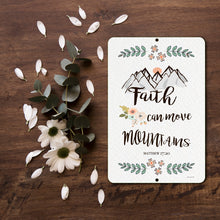 Load image into Gallery viewer, Faith Can Move Mountains Metal Sign by Dyenamic Art featuring a hand-drawn mountain scene, floral accents, and Matthew 17:20 scripture. Made in the USA.
