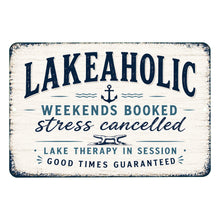 Load image into Gallery viewer, Lakeaholic metal sign with funny lake saying weekends booked stress cancelled lake therapy in session good times guaranteed
