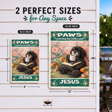 Load image into Gallery viewer, Two sizes of a poster with a dog reading a book and 'PAWS Jesus' text, displayed on a wooden panel background.
