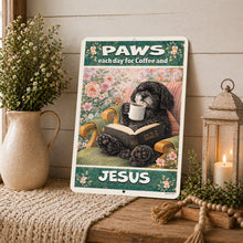 Load image into Gallery viewer, Decorative sign with a dog reading a book and drinking coffee, text 'PAWS each day for Coffee and Jesus', on a wooden surface with plants and a lantern.
