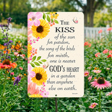 Load image into Gallery viewer, Kiss of the Sun garden sign with sunflower and butterfly design displayed in a colorful flower garden
