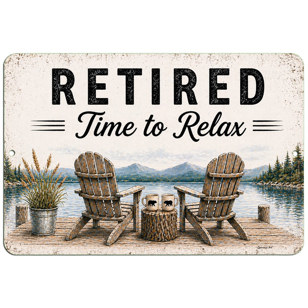 A rectangular decorative sign with rounded corners featuring the words “RETIRED Time to Relax” above an illustrated lakeside scene with two wooden Adirondack chairs, a small tree stump side table, mountains, trees, and a potted plant.