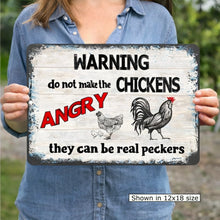 Load image into Gallery viewer, Funny chicken coop warning sign held by person, “Do Not Make the Chickens Angry” rustic farmhouse decor in 12x18 size
