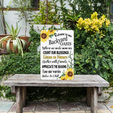 Load image into Gallery viewer, welcome to our backyard oasis metal sign with sounflower design and inspirational sayings from Dyenamic Art
