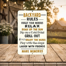 Load image into Gallery viewer, A rectangular metal sign with a rustic white background and humorous backyard rules printed in black and mustard yellow, displayed on a wooden table with a blurred outdoor backyard scene in the background.
