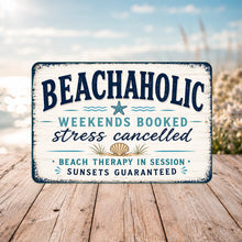 Load image into Gallery viewer, Beachaholic aluminum beach sign displayed outdoors with a coastal beach background
