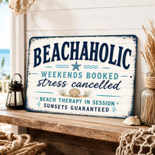 Load image into Gallery viewer, Beachaholic coastal sign displayed on a rustic shelf with seashell beach decor
