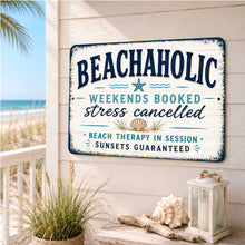 Load image into Gallery viewer, Beachaholic beach house sign styled in a bright coastal room with seaside decor
