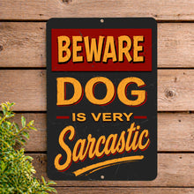 Load image into Gallery viewer, Vintage-style sign with 'Beware Dog is Very Sarcastic' text on a wooden background
