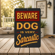 Load image into Gallery viewer, Decorative sign with 'Beware Dog is Very Sarcastic' text on a wooden porch.
