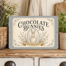 Load image into Gallery viewer, Chocolate Bunnies vintage rabbit sign displayed on a farmhouse cabinet with spring flowers and cottage decor
