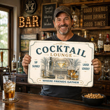 Load image into Gallery viewer, Man in bar holding a vintage Cocktail Lounge metal sign featuring tropical cocktail bar artwork 
