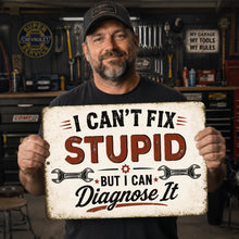 Load image into Gallery viewer, Man holding I Can't Fix Stupid But I Can Diagnose It mechanic sign in garage
