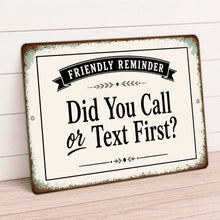 Load image into Gallery viewer, Metal sign with text 'Friendly Reminder: Did You Call or Text First?' on a wooden surface.
