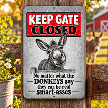 Load image into Gallery viewer, Funny donkey Keep Gate Closed metal sign mounted on a rustic farm gate with barn and donkey in the background
