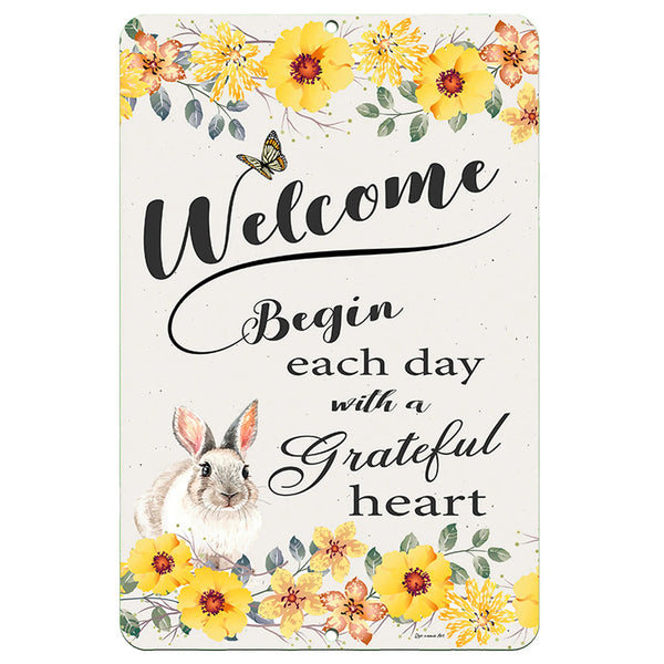 Dyenamic Art Bunny Rabbit Welcome Metal Sign – Charming floral design with a rabbit, yellow flowers, and an inspirational quote.
