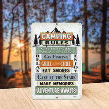 Load image into Gallery viewer, Camping Rules Adventure Awaits Metal Sign displayed at a scenic campsite with warm sunset lighting, creating the perfect campfire ambiance.

