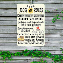 Load image into Gallery viewer, Dog Rules Metal Sign – Inspirational pet lover’s wall décor displayed on a rustic wooden fence, ideal for gardens, patios, or dog-friendly spaces.
