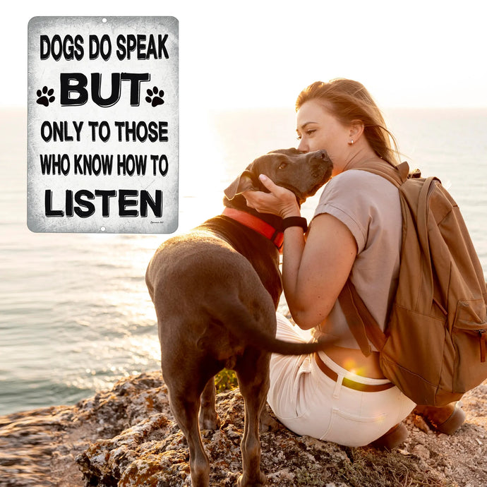 Dogs Do Speak Metal Sign – Inspirational pet quote wall décor displayed in a scenic outdoor setting, perfect for dog lovers and pet-friendly spaces.