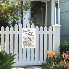 Load image into Gallery viewer, Dyenamic Art Dragonfly Sign mounted on a white picket fence with a charming outdoor setting.
