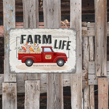 Load image into Gallery viewer, Farm Life metal sign featuring a red truck and autumn flowers, attached to a distressed wooden fence, blending perfectly with rustic outdoor farmhouse decor.
