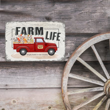 Load image into Gallery viewer, Vintage-inspired Farm Life sign mounted on a barn wall with an old wagon wheel, creating a timeless country farmhouse aesthetic.
