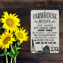 Load image into Gallery viewer, Inspirational Farmhouse Rules sign placed near vibrant sunflowers, enhancing a welcoming farmhouse aesthetic with its motivational message.
