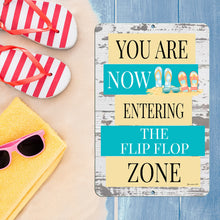 Load image into Gallery viewer, Dyenamic Art 'Flip Flop Zone' metal sign displayed on a beach scene with ocean waves and flip-flops, creating a vibrant and summery coastal decor piece.
