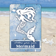 Load image into Gallery viewer, Dyenamic Art 'Follow Your Inner Mermaid' sign displayed on a sandy beach background with seashells and starfish, creating a serene ocean-inspired decor piece.
