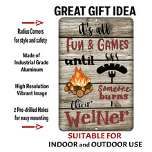 Load image into Gallery viewer, It&#39;s All Fun and Games Until Someone Burns Their Weiner Metal Sign – Features a rustic wood background with campfire and hot dog illustration. Durable aluminum with pre-drilled holes.
