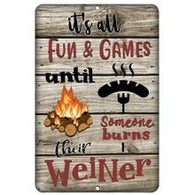 Load image into Gallery viewer, It&#39;s All Fun and Games Until Someone Burns Their Weiner Metal Sign – Funny camping decor with campfire humor, ideal for RVs, campsites, and outdoor enthusiasts by Dyenamic Art.
