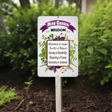 Load image into Gallery viewer, Herb Garden Wisdom Metal Sign displayed in a garden setting with lush greenery, perfect for plant lovers.
