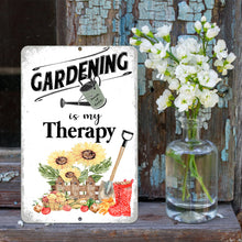 Load image into Gallery viewer, Gardening Is My Therapy Metal Sign styled with flowers and rustic elements, ideal for sheds, greenhouses, and patios.
