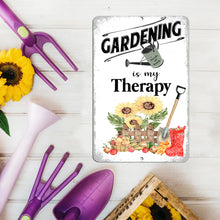 Load image into Gallery viewer, Gardening Is My Therapy Metal Sign set with garden tools and sunflowers, adding charm to potting areas and country homes.
