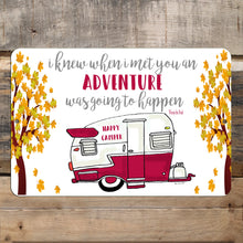 Load image into Gallery viewer, Happy Campers Metal Sign displayed on a rustic wooden surface, adding a warm and nostalgic touch to camper or cabin decor.
