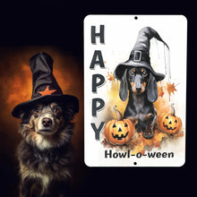 Load image into Gallery viewer, Detailed close-up of the Happy Howl-o-ween Metal Sign, featuring a black and tan dachshund in a dripping witch hat, surrounded by carved pumpkins and fall foliage.
