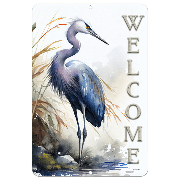 Dyenamic Art Heron Welcome Metal Sign – Elegant great blue heron standing in marsh reeds, painted in watercolor style. Coastal welcome sign for beach homes, porches, and gardens.