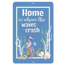 Load image into Gallery viewer, Dyenamic Art Home Is Where the Waves Crash Metal Sign – Nautical wall decor featuring a whimsical seahorse surrounded by coral, starfish, and seashells against a deep blue ocean background.
