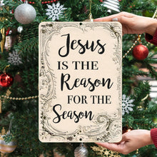 Load image into Gallery viewer, Jesus Is the Reason for the Season Metal Sign – Elegant holiday wall decor featuring ornate detailing, perfect for Christmas displays or gifting.
