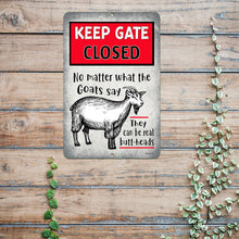 Load image into Gallery viewer, Funny goat warning sign displayed on a rustic wooden farm fence, adding a humorous touch to livestock enclosures and rural settings.
