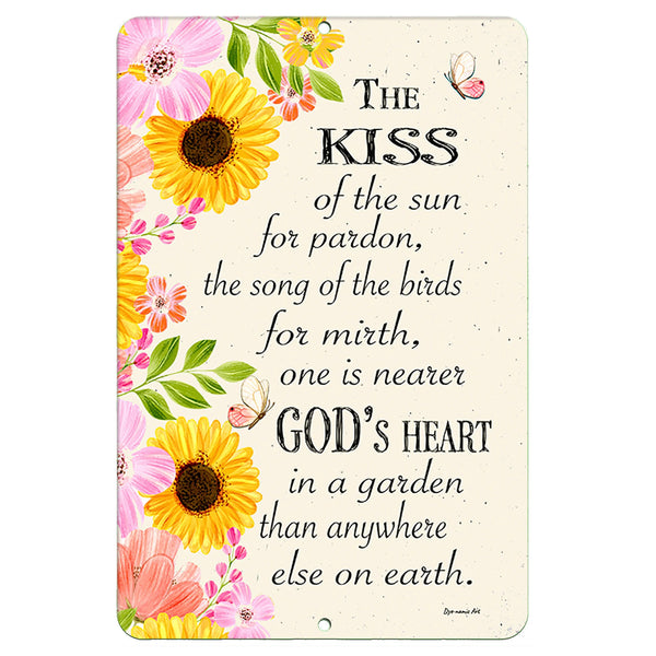 Dyenamic Art Kiss of the Sun metal sign featuring a floral border of sunflowers and pink blossoms, paired with an inspirational garden quote.