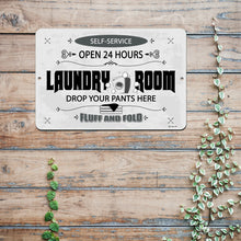 Load image into Gallery viewer, Retro Laundry Room Sign styled on a vintage wood background with laundry essentials, adding character and charm to washroom spaces.
