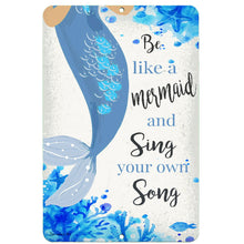 Load image into Gallery viewer, Dyenamic Art 'Be Like a Mermaid and Sing Your Own Song' metal sign featuring a vibrant blue mermaid tail with watercolor coral and starfish accents. A whimsical coastal decor piece.
