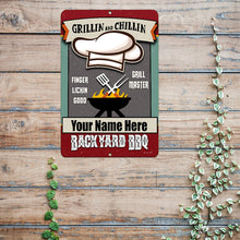 Load image into Gallery viewer, Personalized Backyard Metal Sign – Displayed on a Rustic Wooden Surface with a Heart Ornament, Creating a Cozy and Inviting Backyard Setting.
